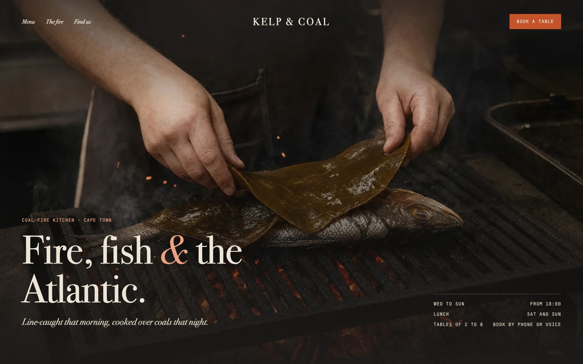 The Kelp and Coal homepage concept: hands laying kelp over fish on the coals under the headline Fire, fish and the Atlantic, with the opening days
