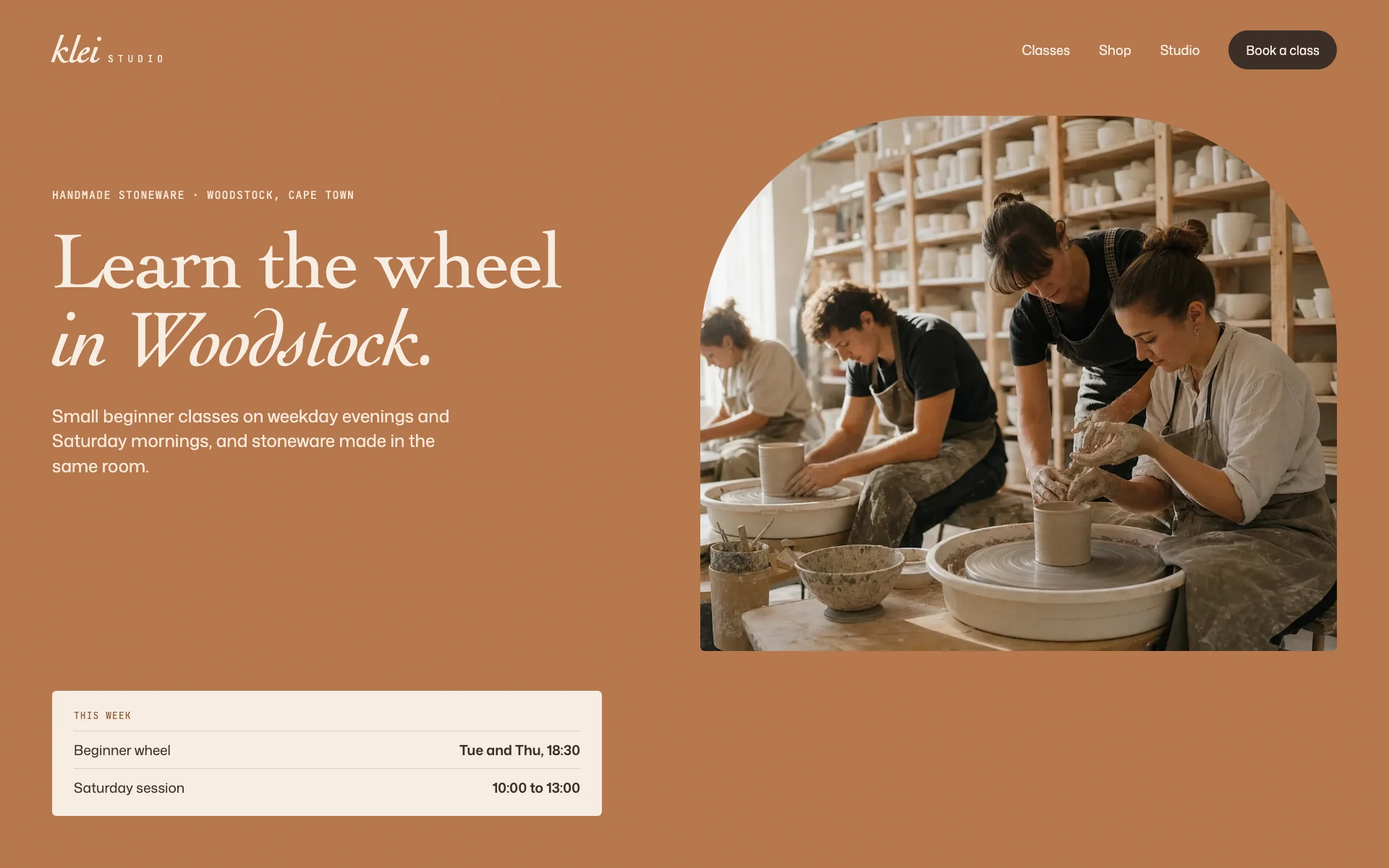 The Klei Studio homepage concept: the headline Learn the wheel in Woodstock beside an arched photo of a beginner class at the wheels, with this week's class times